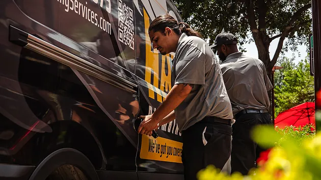 HAT Plumbing, Heating & Air team and vehicle 2